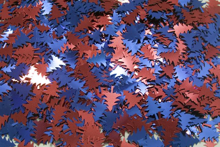hundreds of metallic christmas tree shapes in red and blue