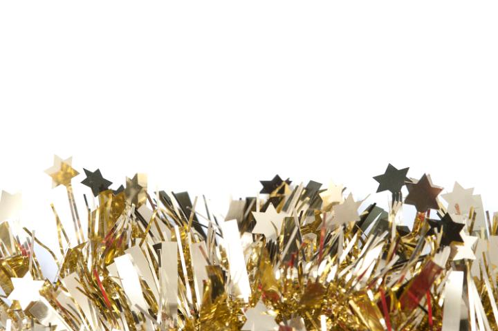 Glittering gold tinsel border on a white background for your Christmas and seasonal greetings or message