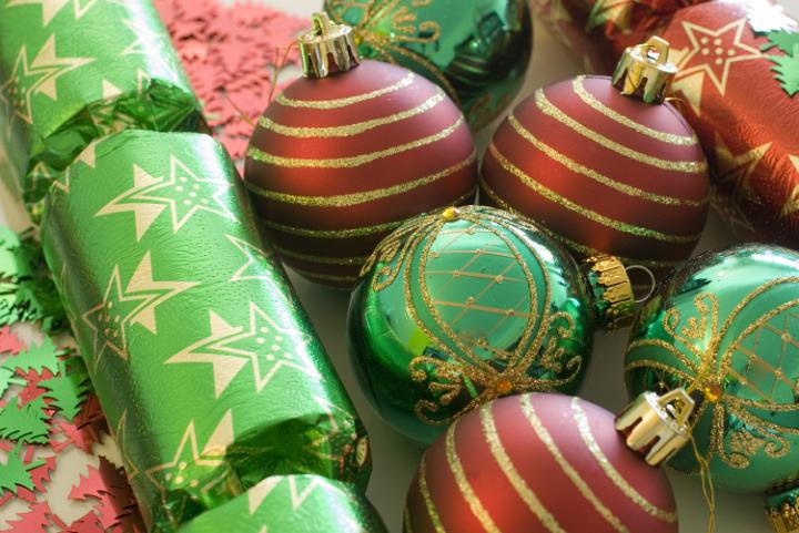 an assortment of red and green festive decorations