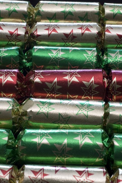 a line of christmas crackers arranged in parallel
