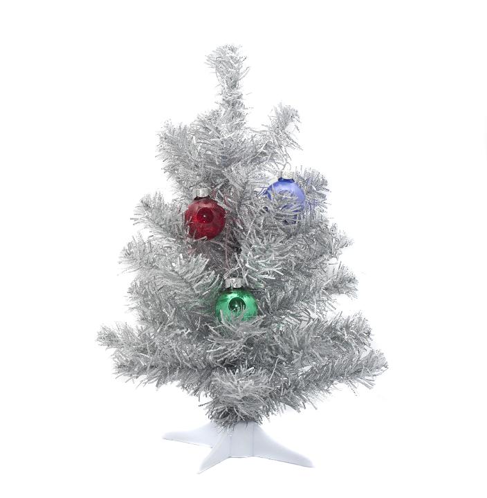 a mini silver plastic christmas tree and hanging ornaments