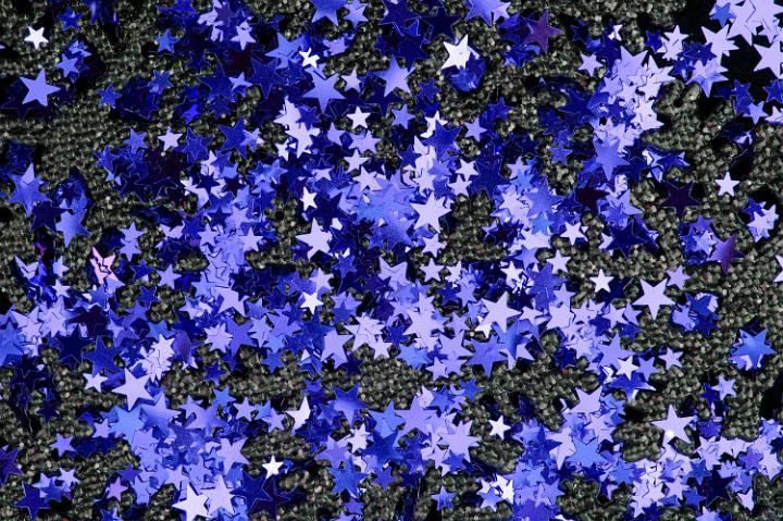 a background of blue metallic star shapes