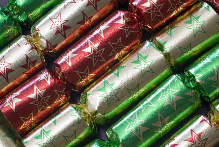a row of colourful christmas crackers
