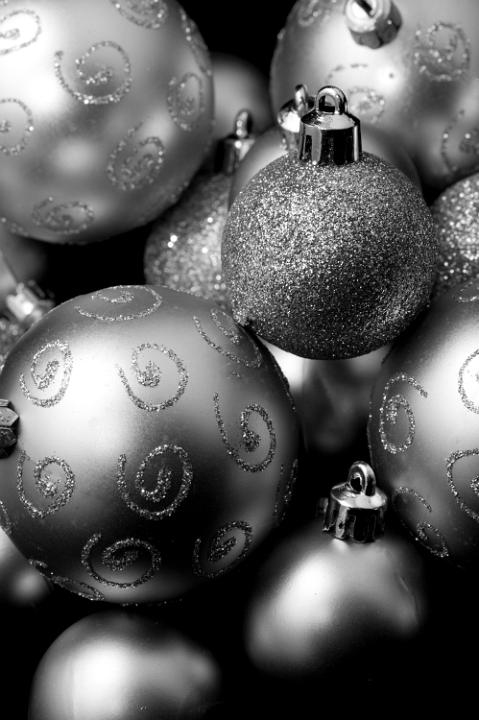 black and white image of christmas bauble tree ornaments