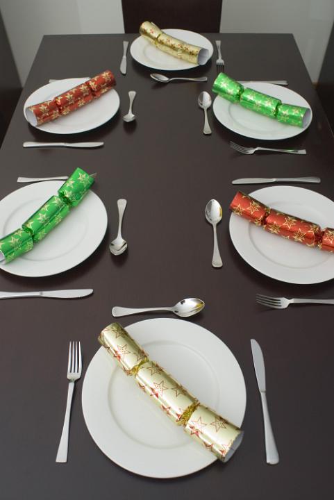 a modern dining table set for a christmas dinner for 6 people