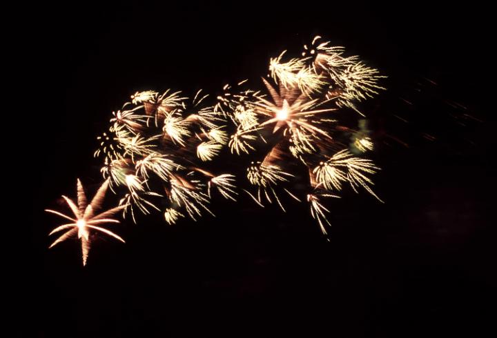 fireworks sparkling in the night sky, celebration of christmas and the new year